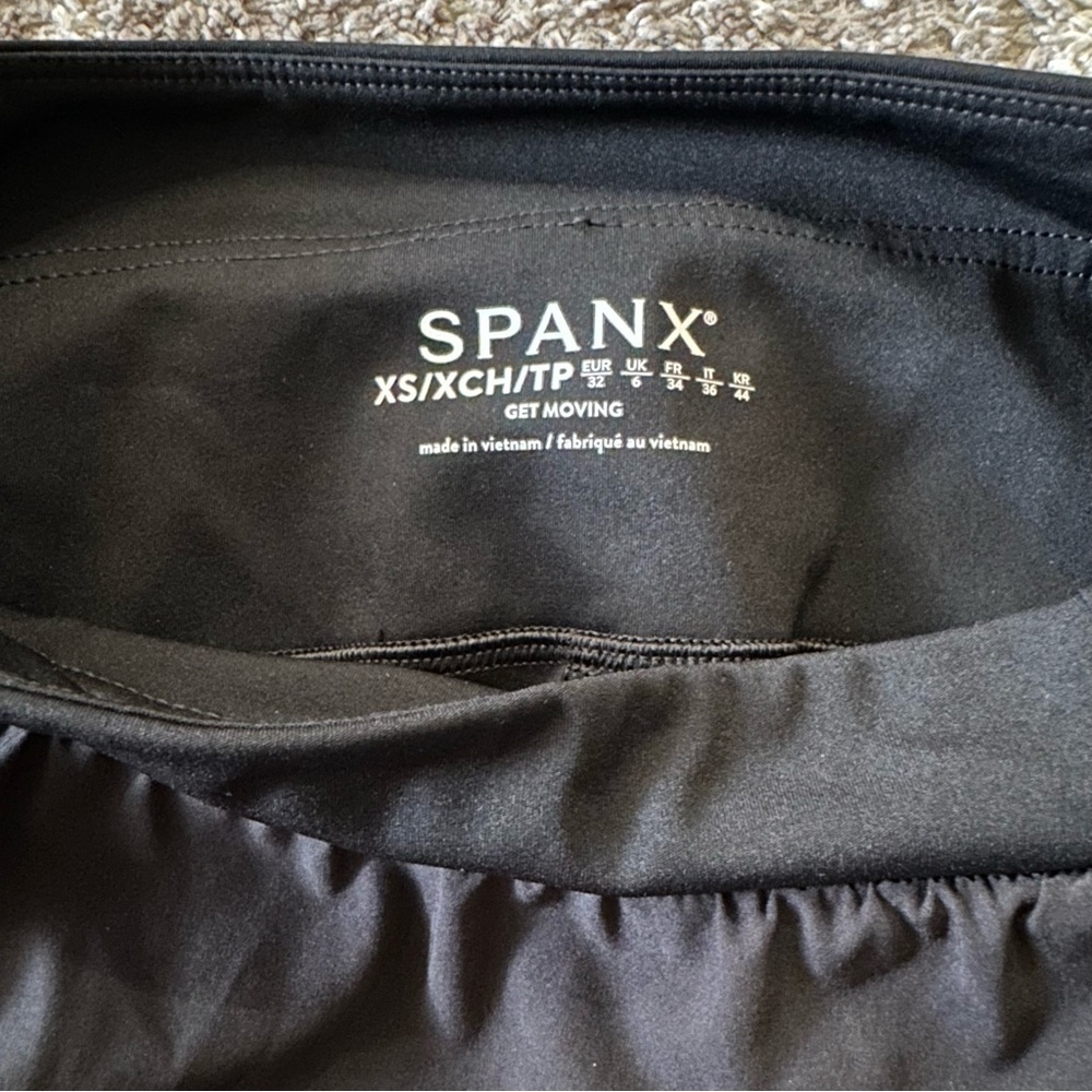 Spanx The Get Moving Pleated 14" Skort Black - Picture 8 of 14